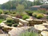 Side view of retaining walls as part of a landscape design done by a Landscape Architect.
